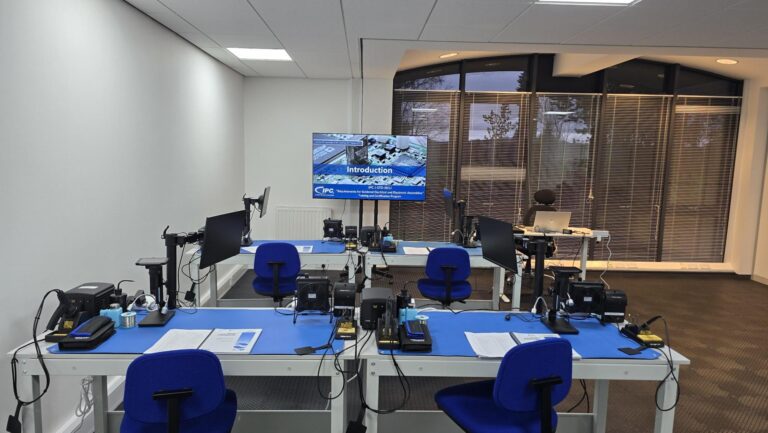 work benches set up for IPC training facing a screen in our aberdeen training centre